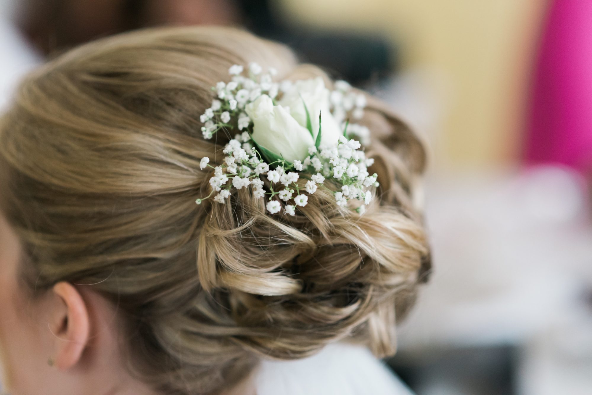 A sailing-themed bride with a flower in her hair at her Key West wedding.