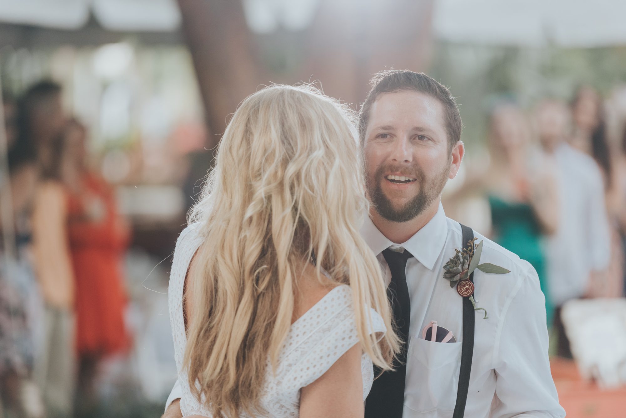 A bride and groom hugging during their Key West wedding.
