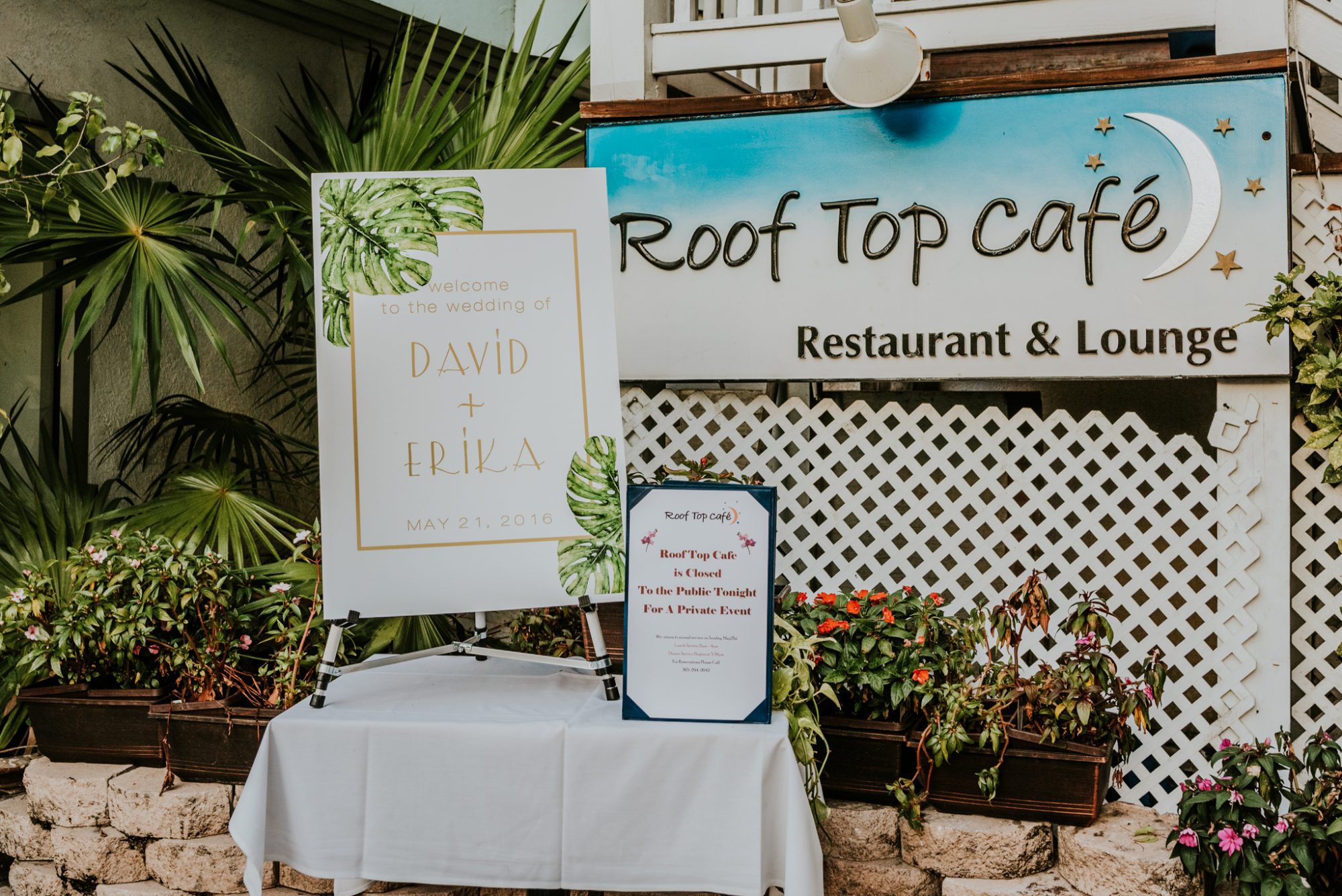 A rooftop cafe and lounge sign, captured by Erika & David - Key West Wedding Photographer.