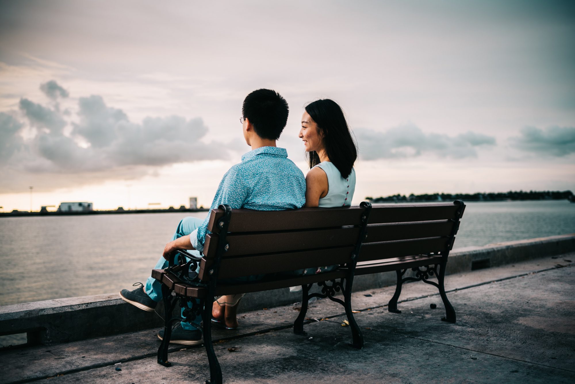 Xiao and Ying enjoying a sunset engagement session by the water in Key West, FL.