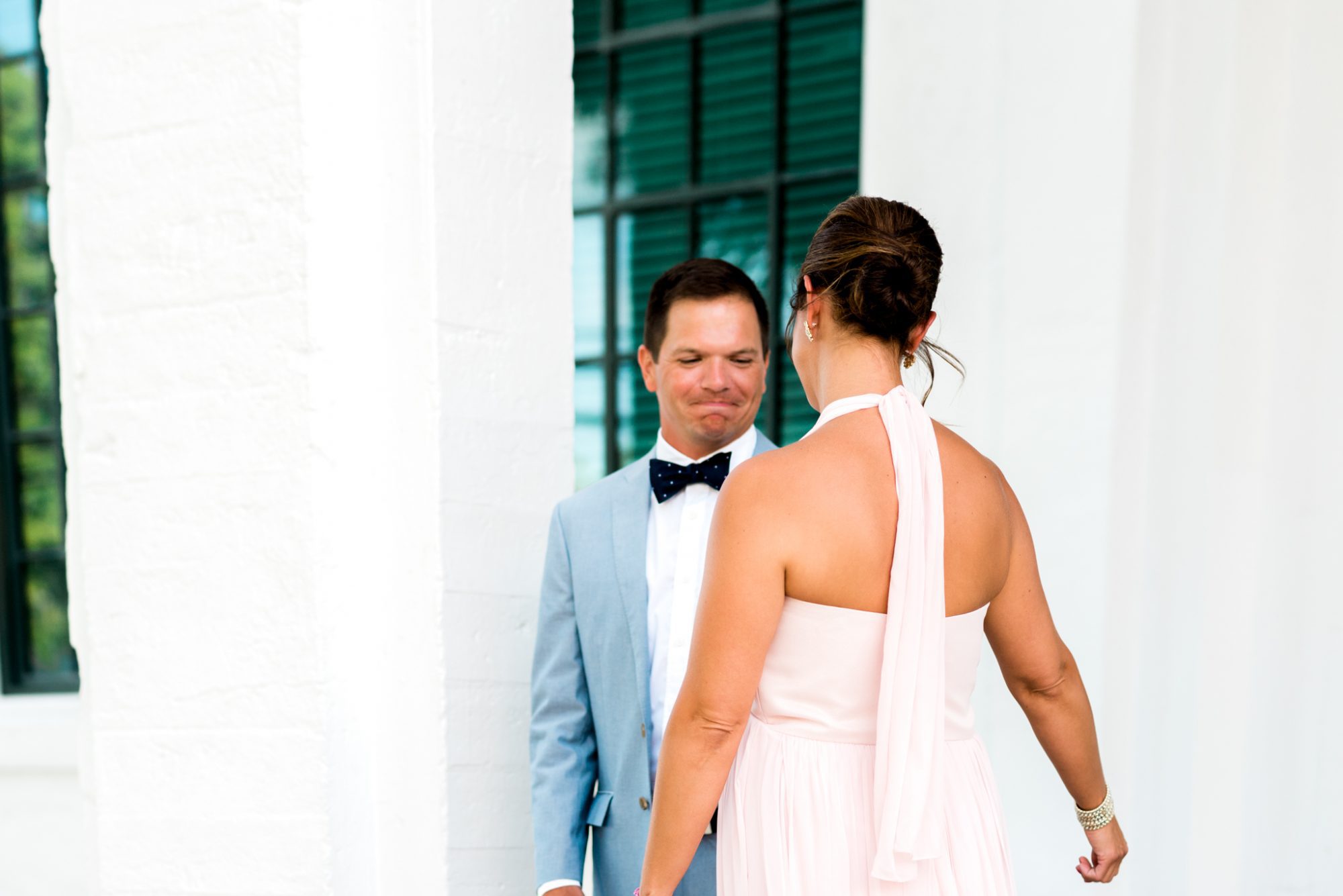 Freya and Jamie's Key West wedding featured a man in a pink suit and a woman in a pink dress.