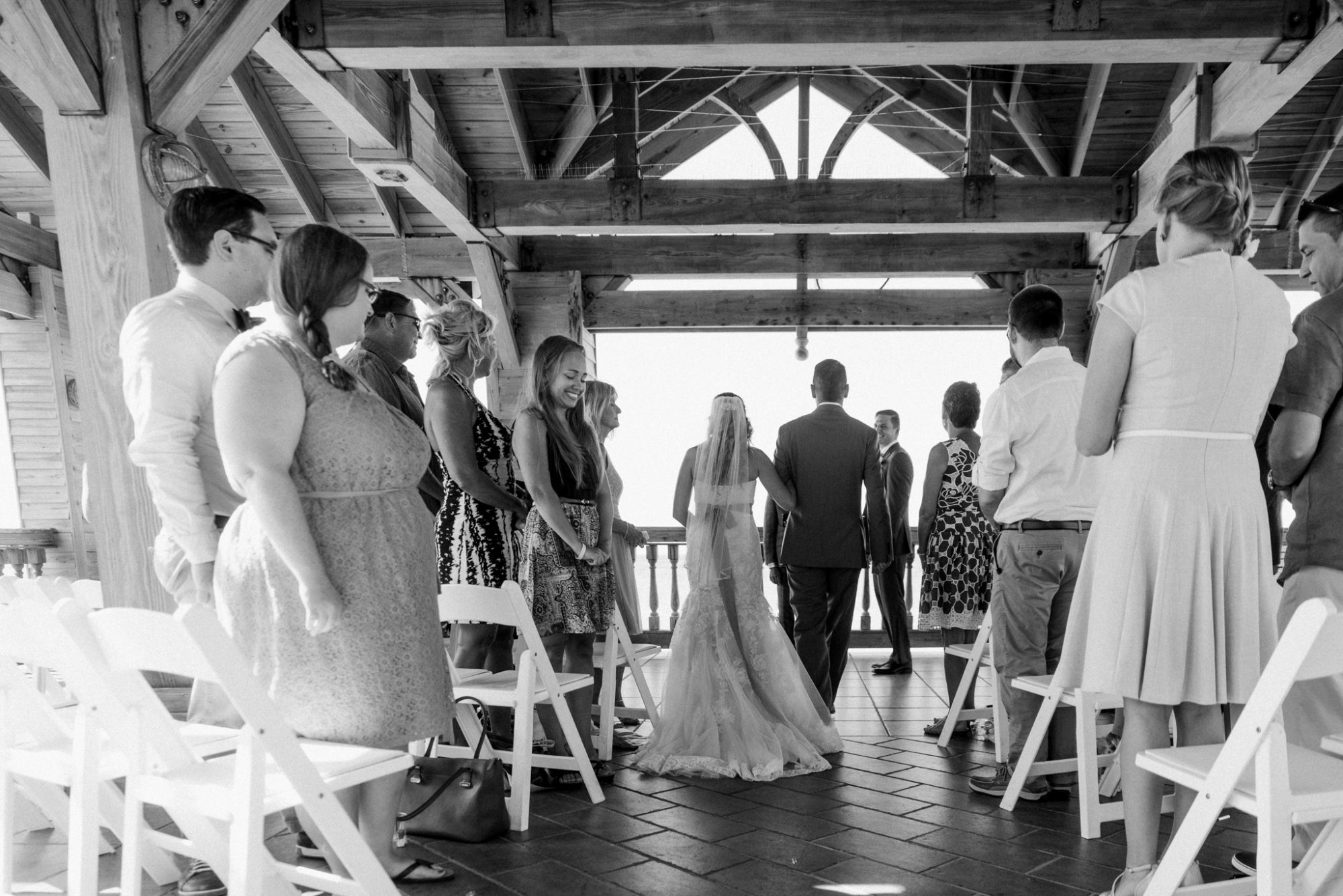 Stacy & Jason, a bride and groom, captured in a black and white photo during their Key West wedding at Reach Resort.
