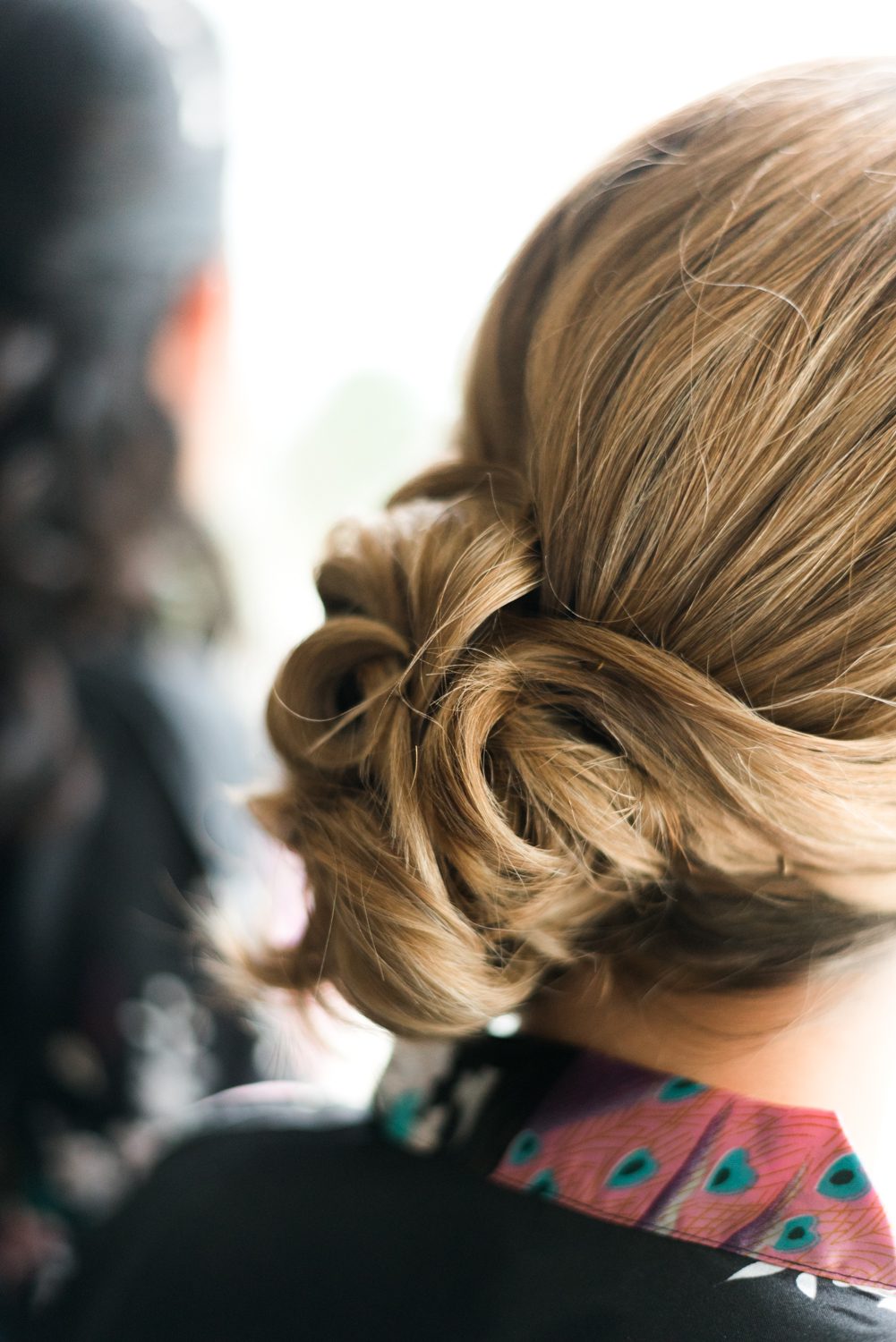 A woman's hair in a bun at a Florida Keys wedding at the Postcard Inn.