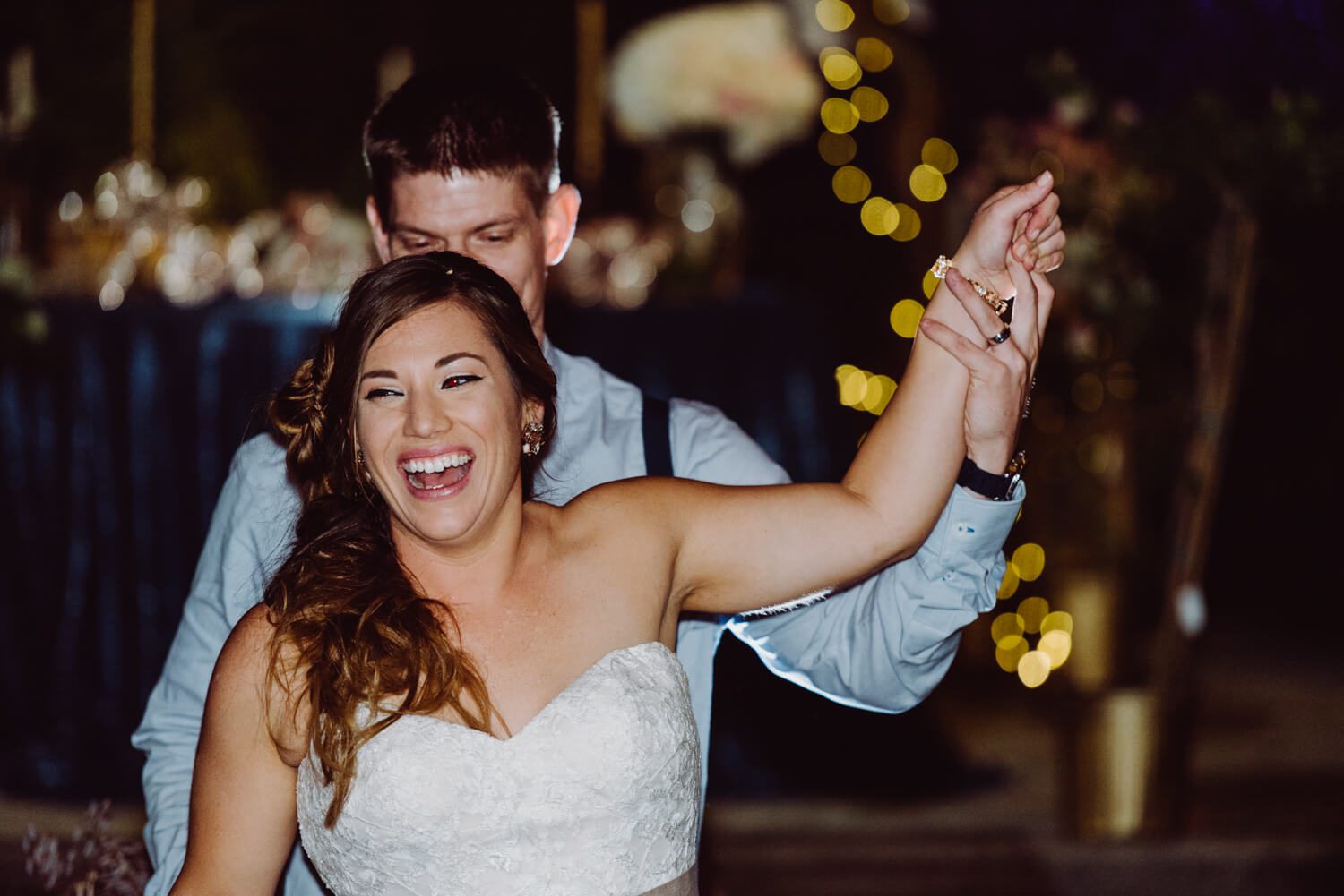 A Key West bride and groom dancing at their wedding reception, captured by Freas Photography.