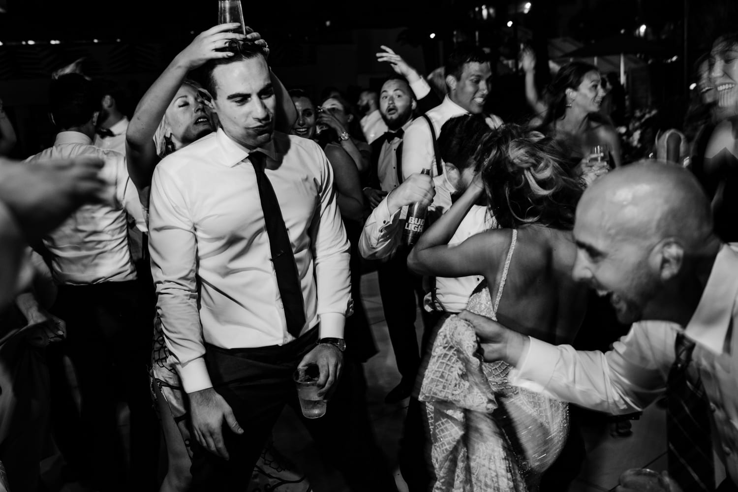 A man dancing on the dance floor at a Miami wedding.