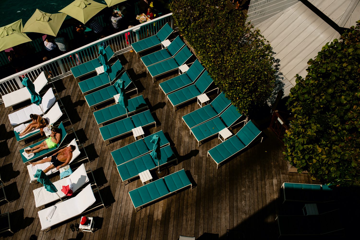 A group of lounge chairs on a deck at Ocean Key Resort in Key West.