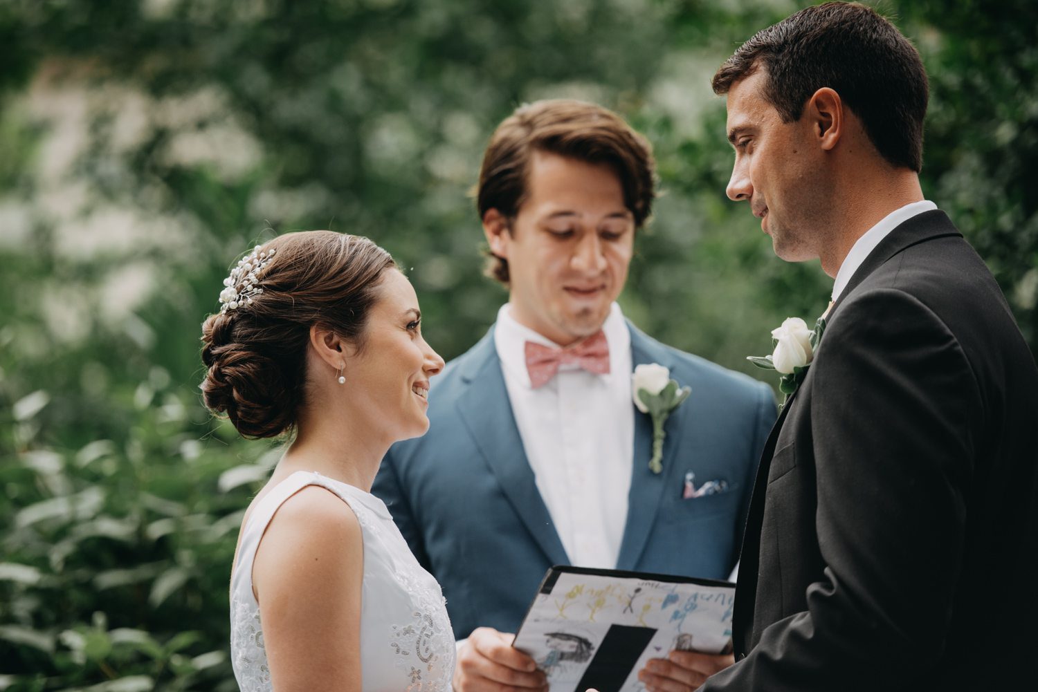 A bride and groom exchange vows during a Dupont Circle wedding ceremony.