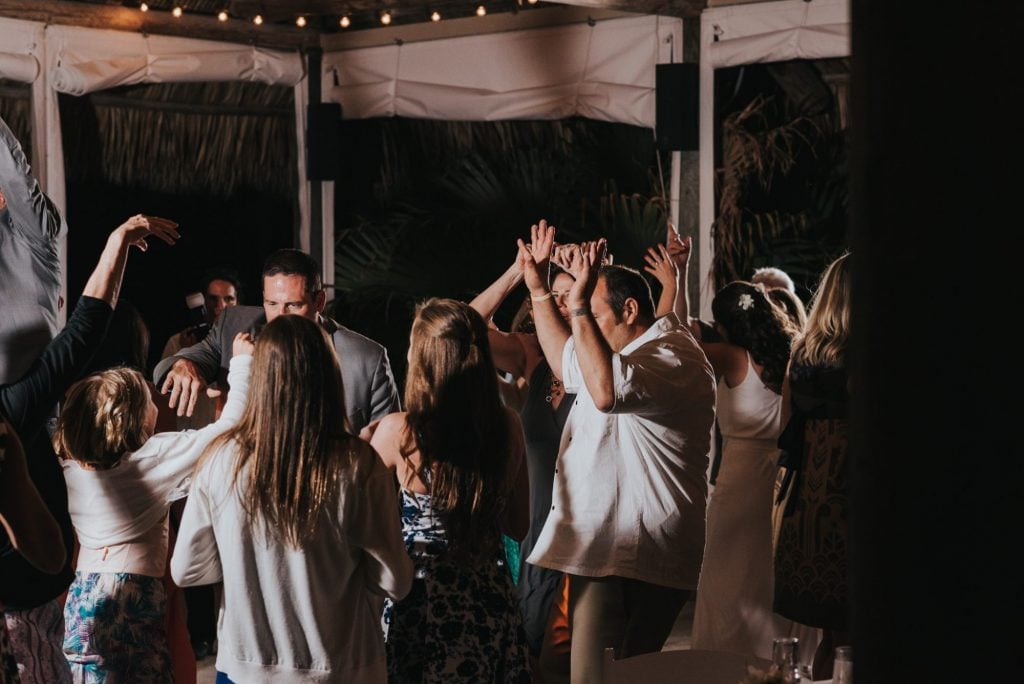 Jennifer and Thomas dancing at their wedding reception at Postcard Inn at Holiday Isle captured by Islamorada Wedding Photographer.