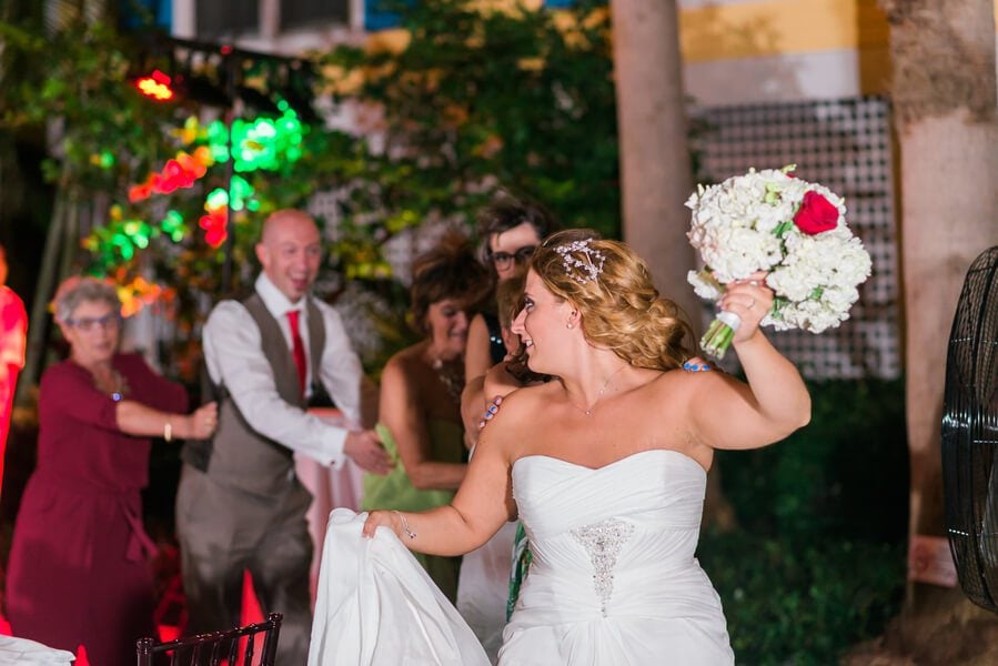 A bride is walking down the aisle at a Key West wedding.