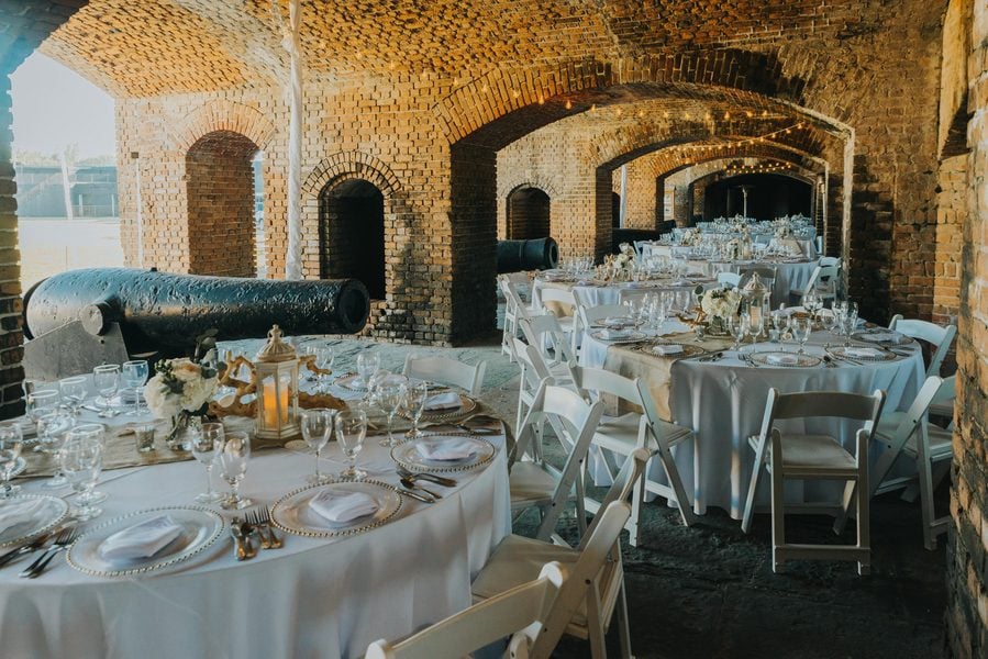 A wedding reception photographed in an old fort by a Key West Wedding Photographer.