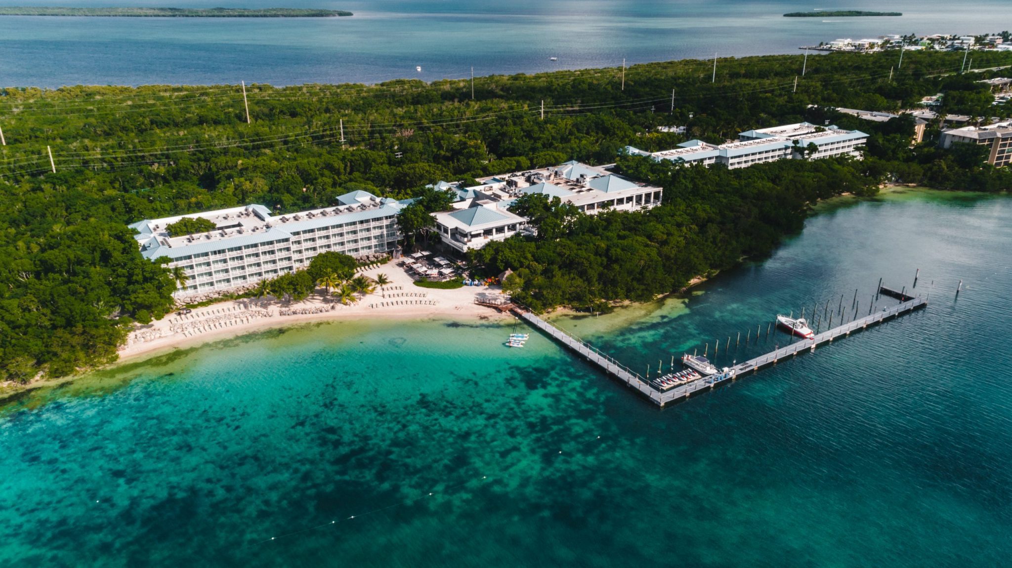 Stunning aerial view of Baker's Cay Resort, showcasing its lush greenery and beachfront