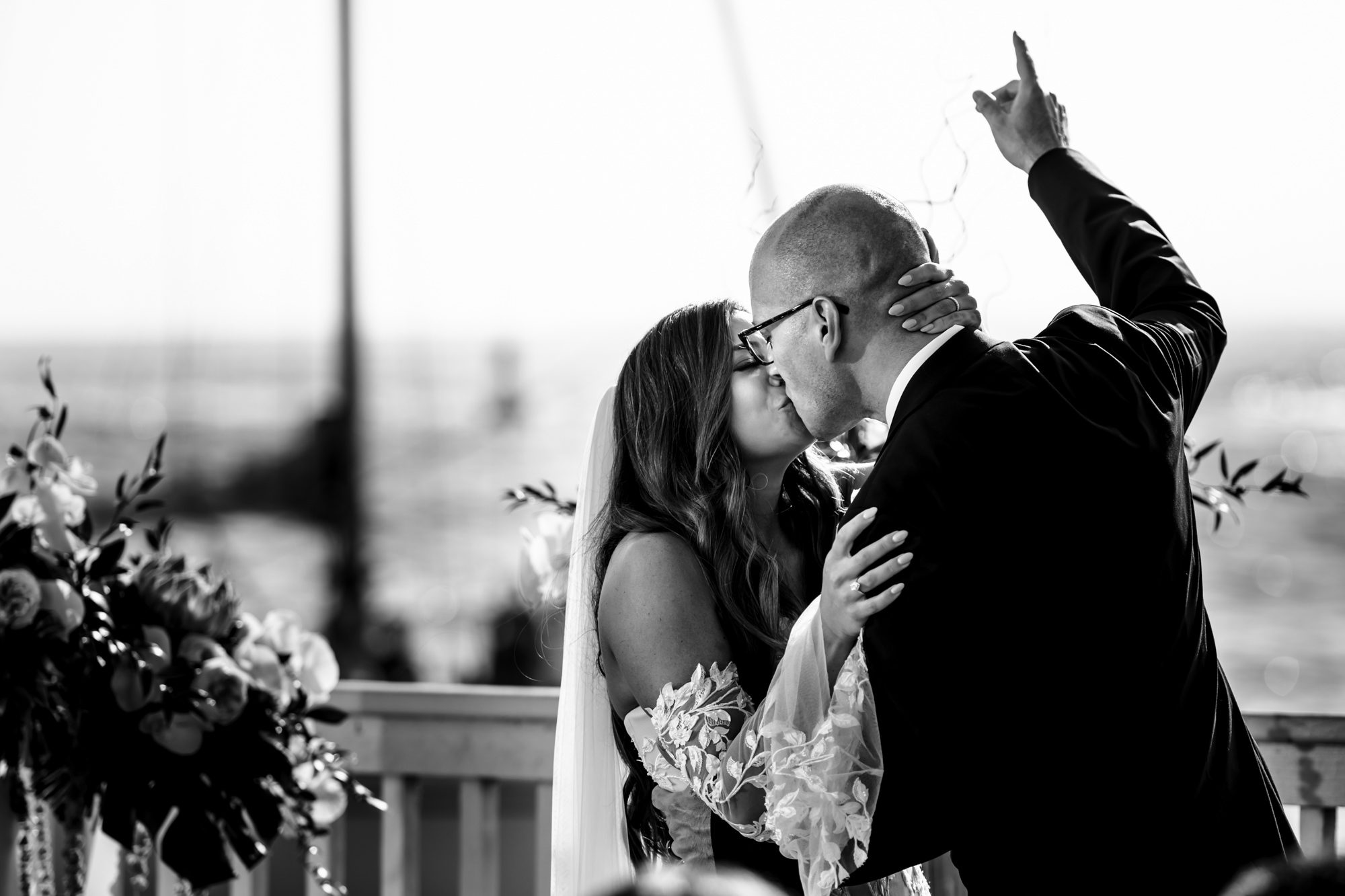 A bride and groom kiss during their Ocean Key Resort wedding ceremony.