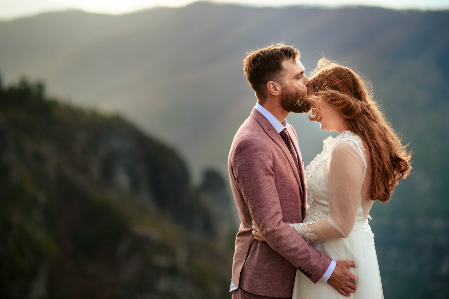 bride and groom on mountain top asheville elopement linville gorge