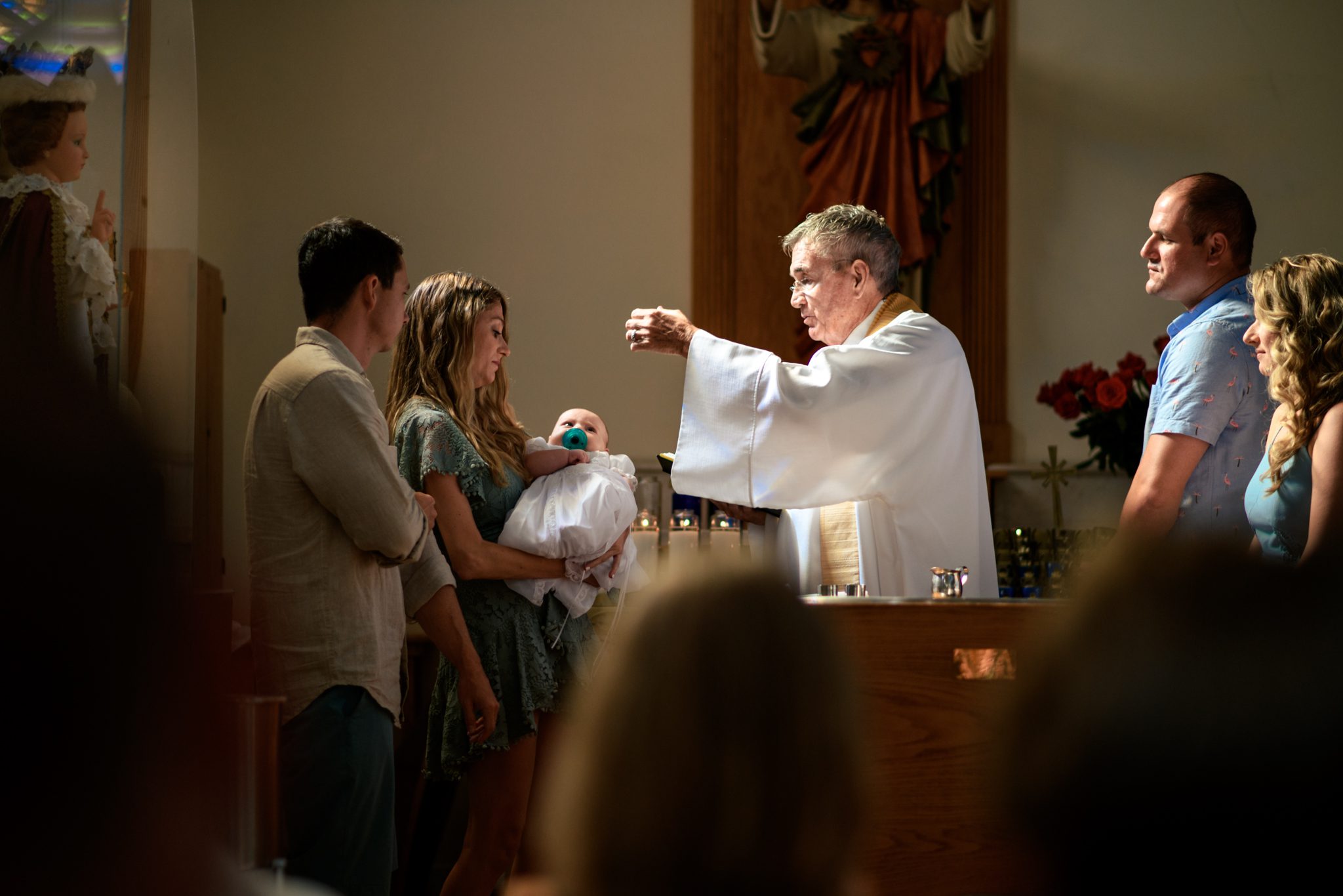 child being baptized in a catholic church