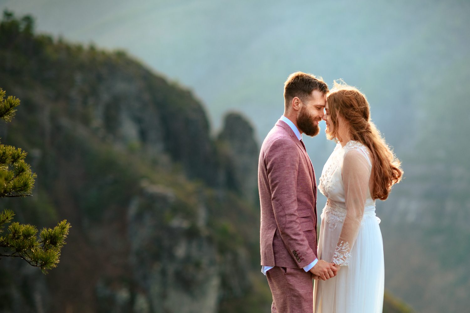 elopement couple standing on edge of linville gorge asheville elopement