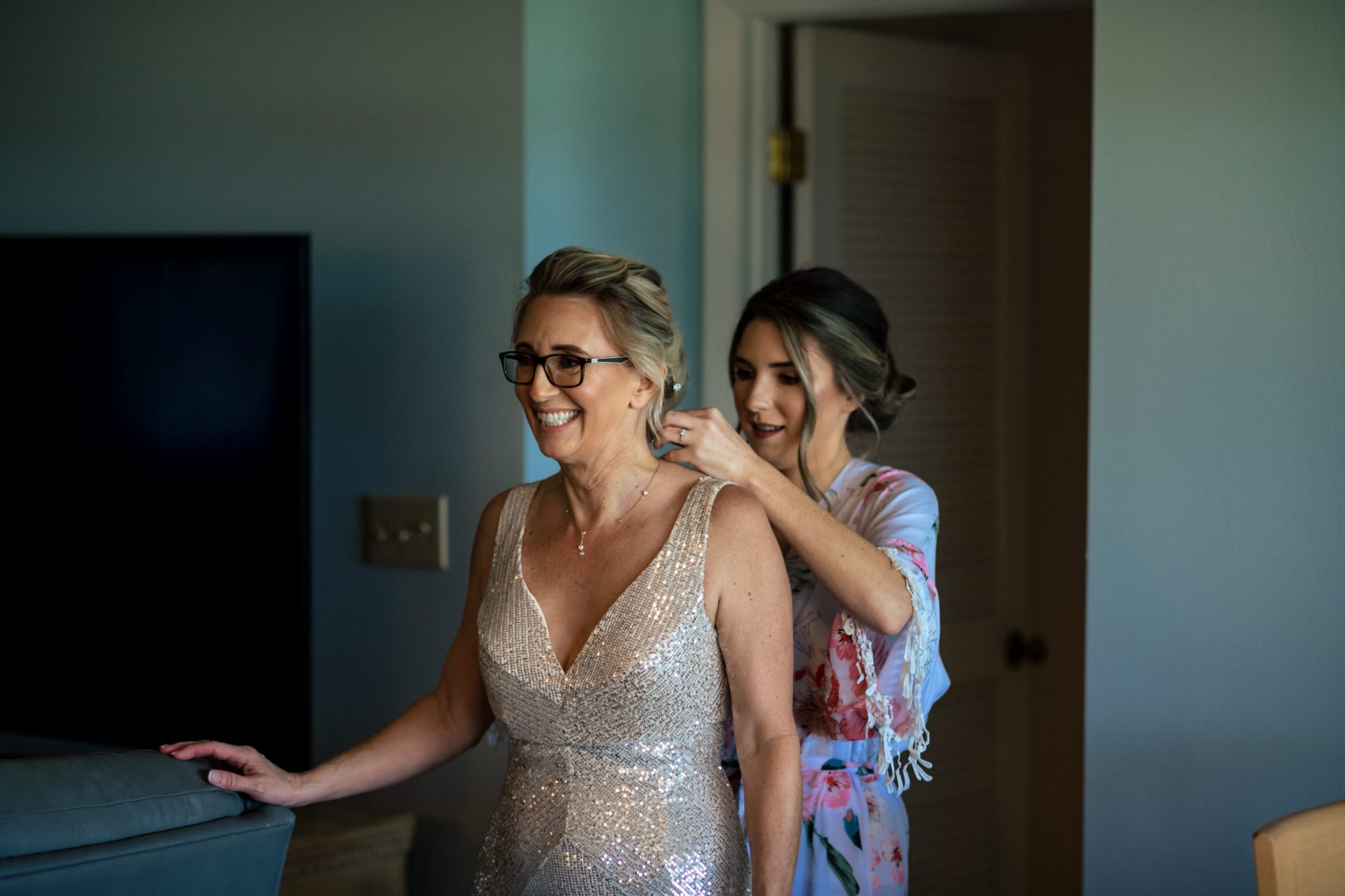 Two brides getting ready for a fall wedding at Fort Zachary Taylor.
