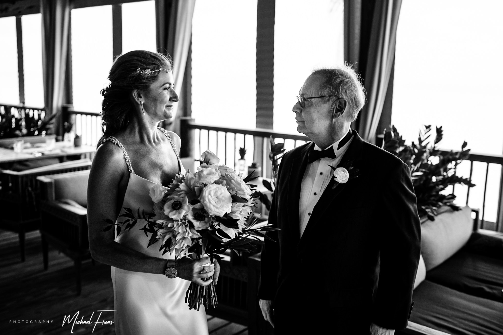 Bride and father having a moment before wedding