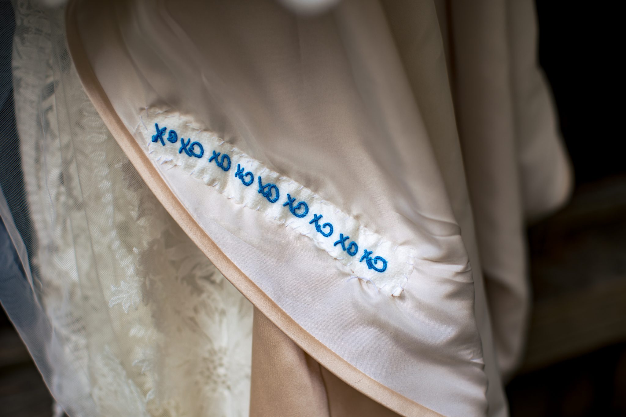 Custom inscription from grandmother on bride dress