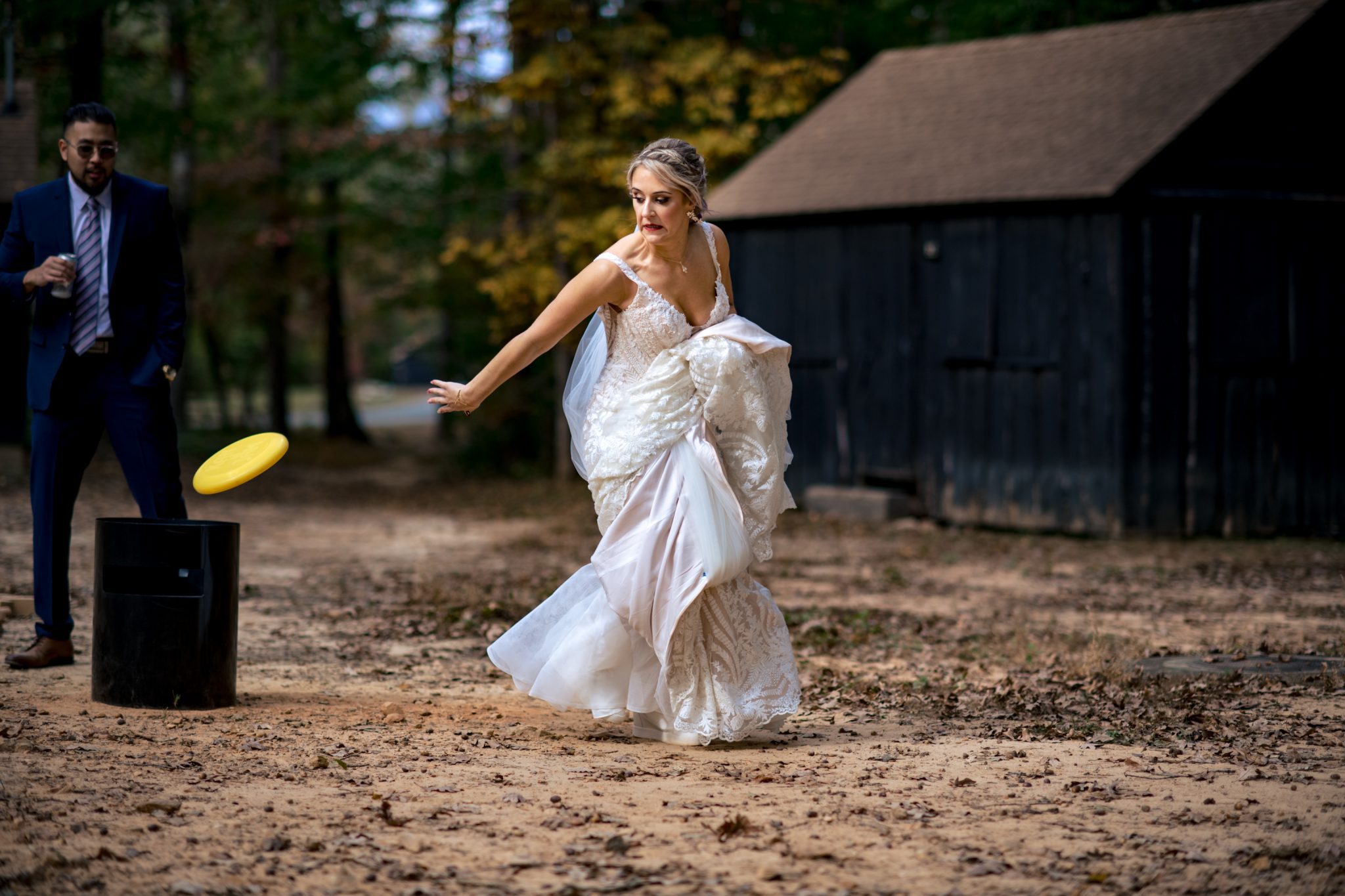 Bride playing can jam in front of cabins at Prince William Forest Park