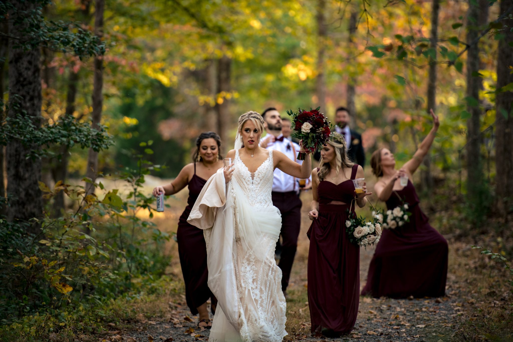 Bridal party walking through fall colors at Prince William Forest Park