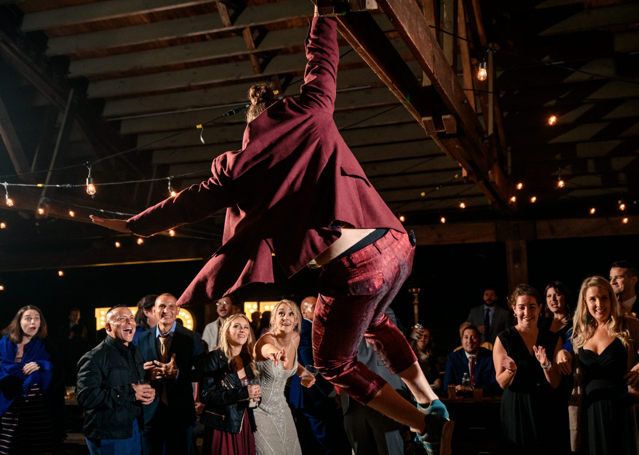 wedding guest hanging from ceiling during wedding reception at prince William forest park