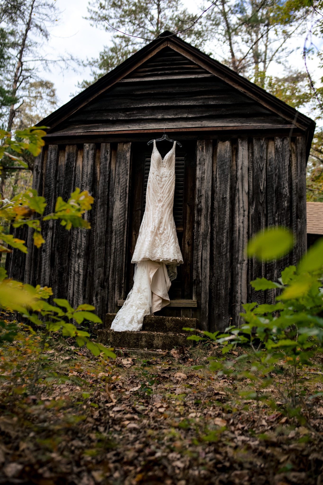 Wedding dress hanging on cabin at Prince William Forest Park