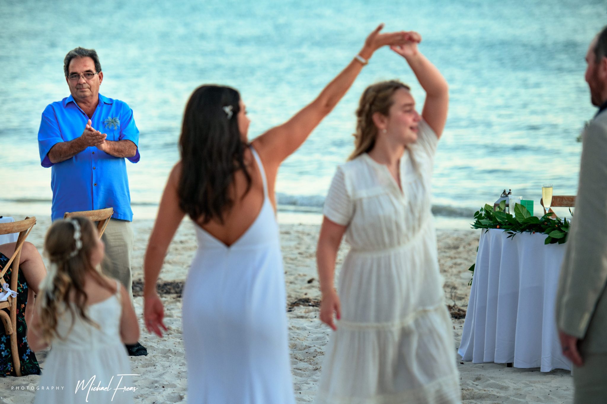 wedding guests dancing on beach at the reach resort in key west florida