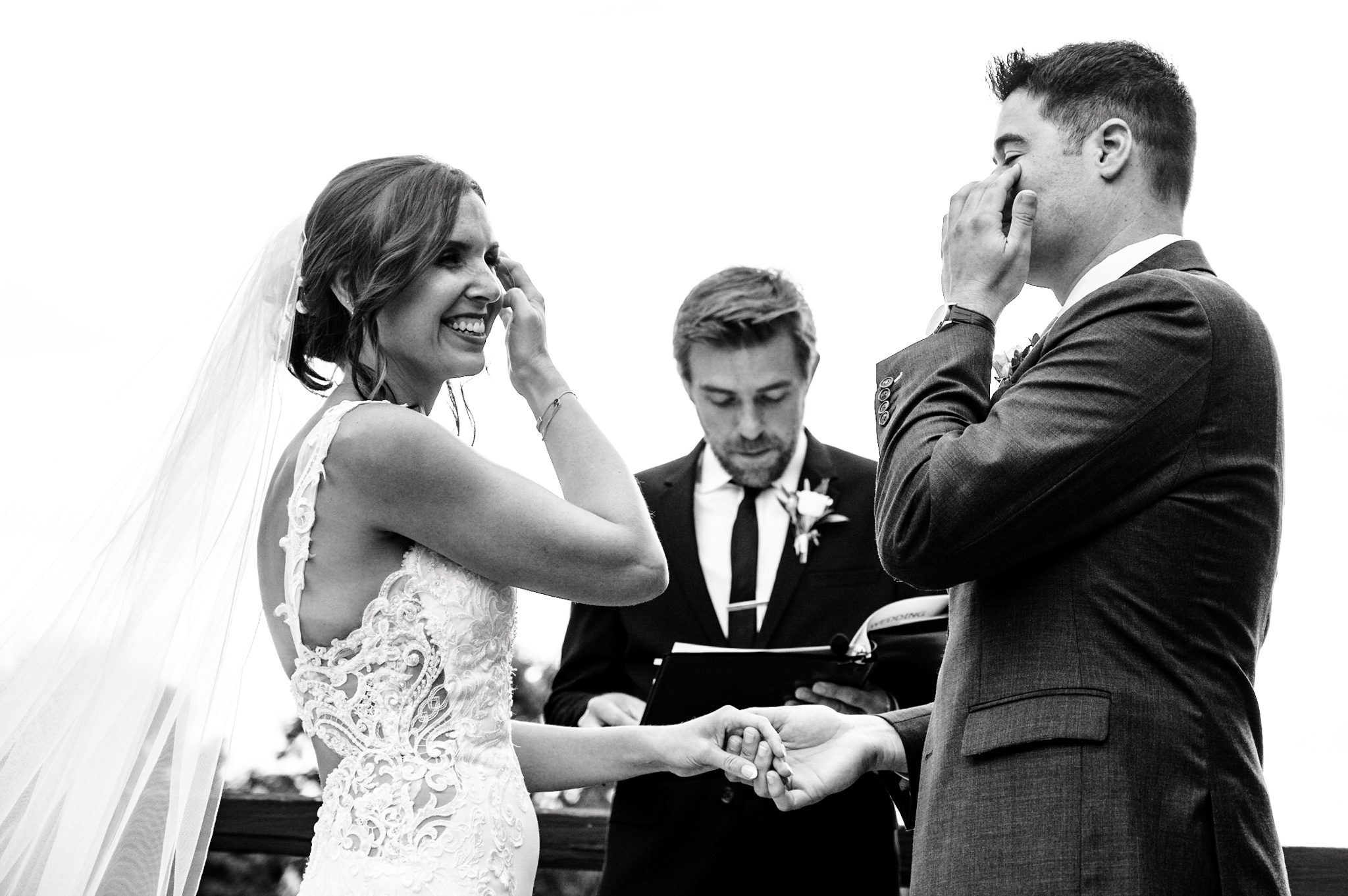 emotional bride and groom during wedding ceremony at crest pavilion in asheville nc