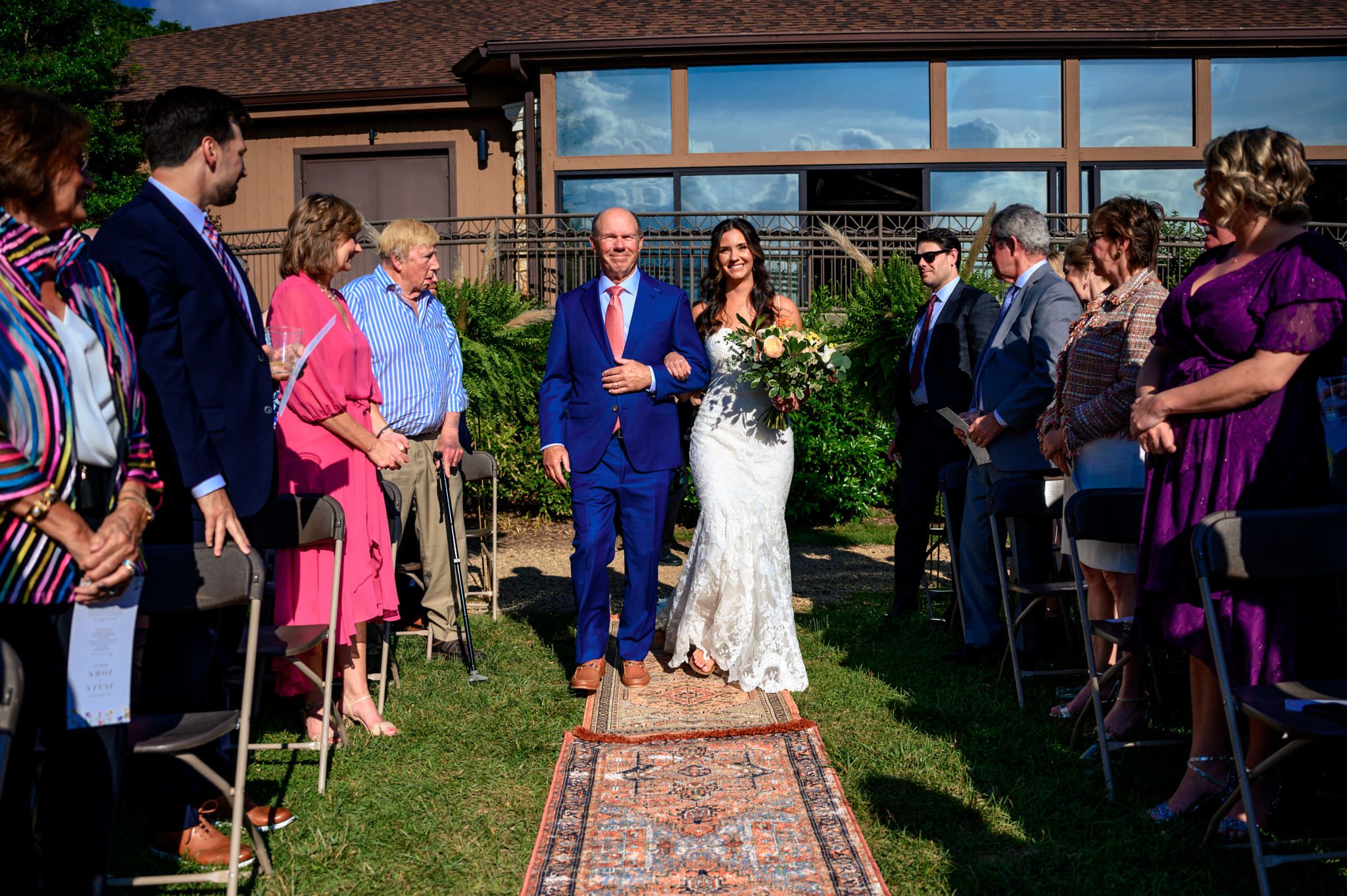 outdoor wedding ceremony at crest pavilion in asheville nc with mountains in the background
