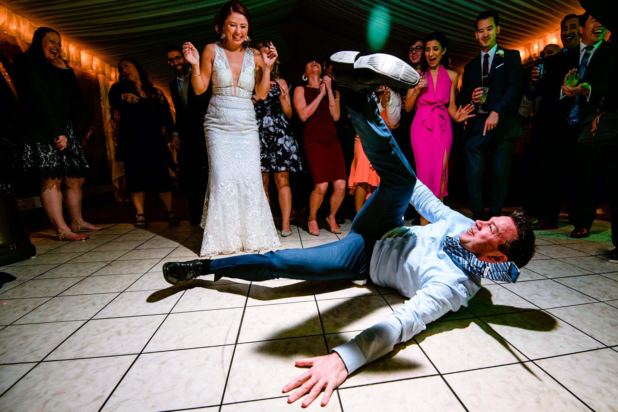 wedding guests breakdancing on dancefloor of key west wedding
