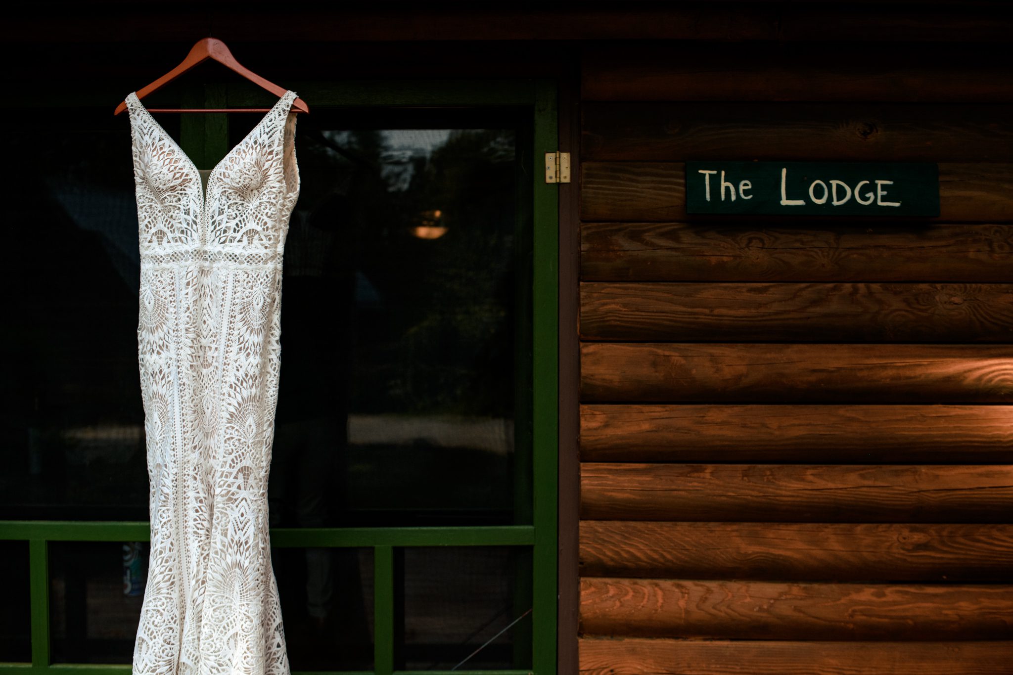 bride and groom get ready at cabins in waynesville nc for a mountain wedding