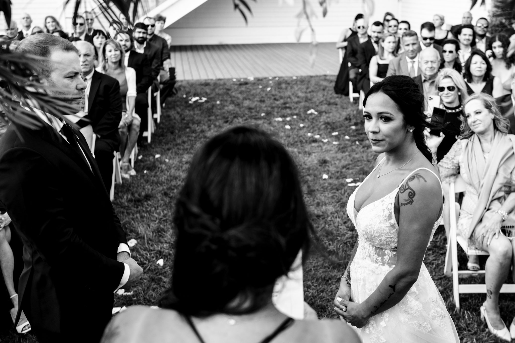 bride arrives at wedding ceremony at newport beach house