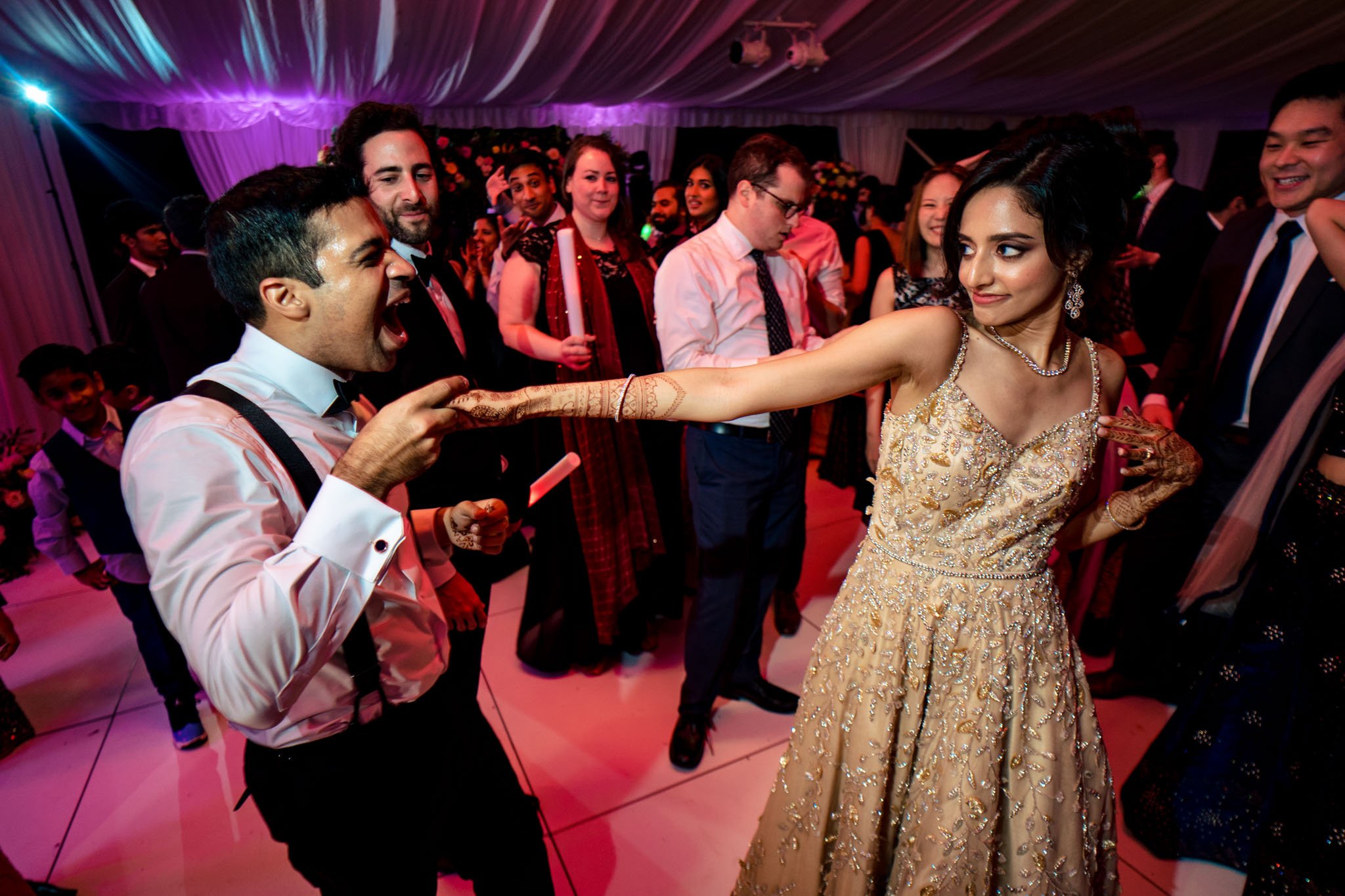 A bride and groom dancing at a Biltmore Estate wedding reception.