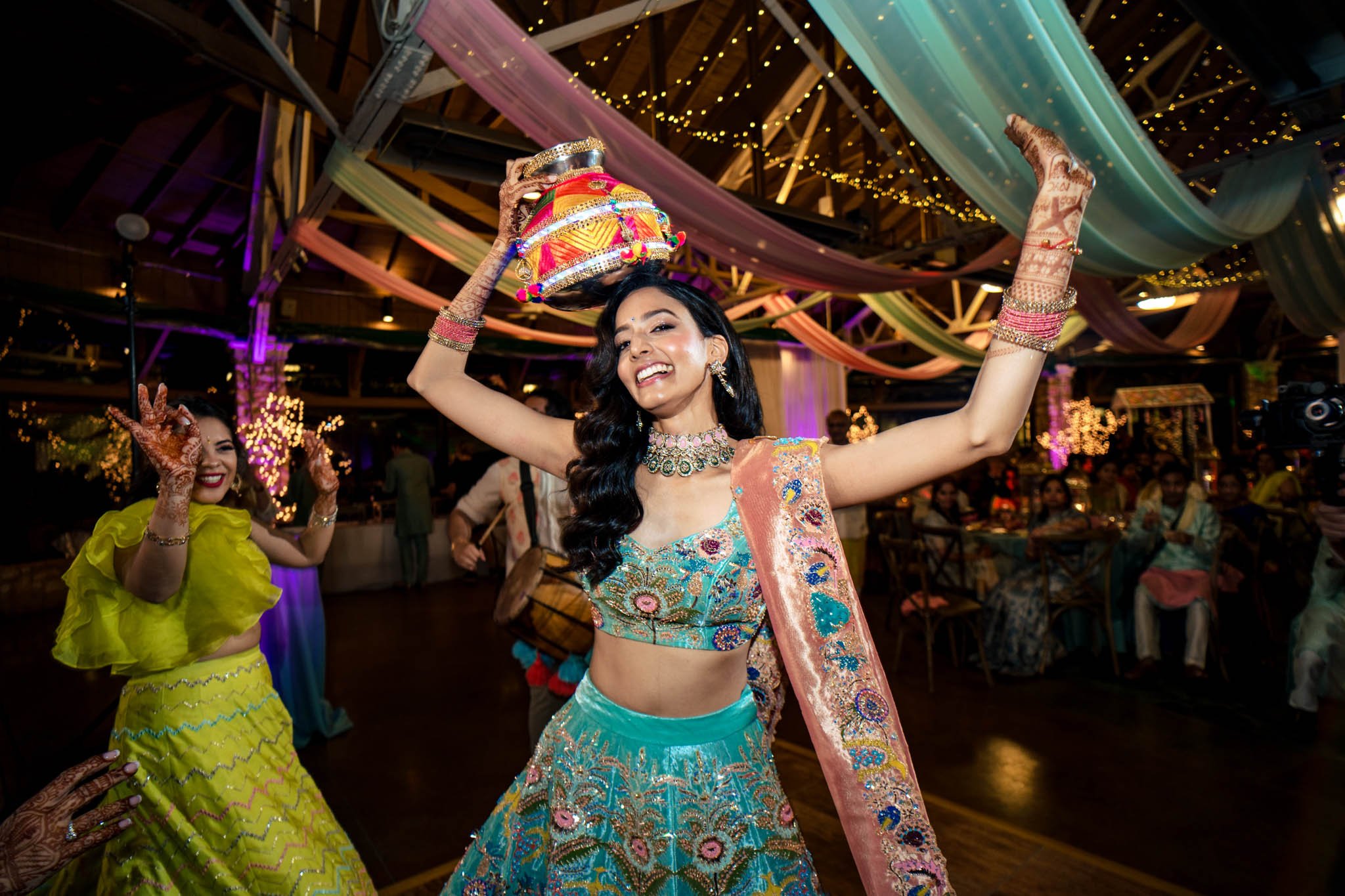 An Indian bride dancing at a Biltmore Estate wedding reception.