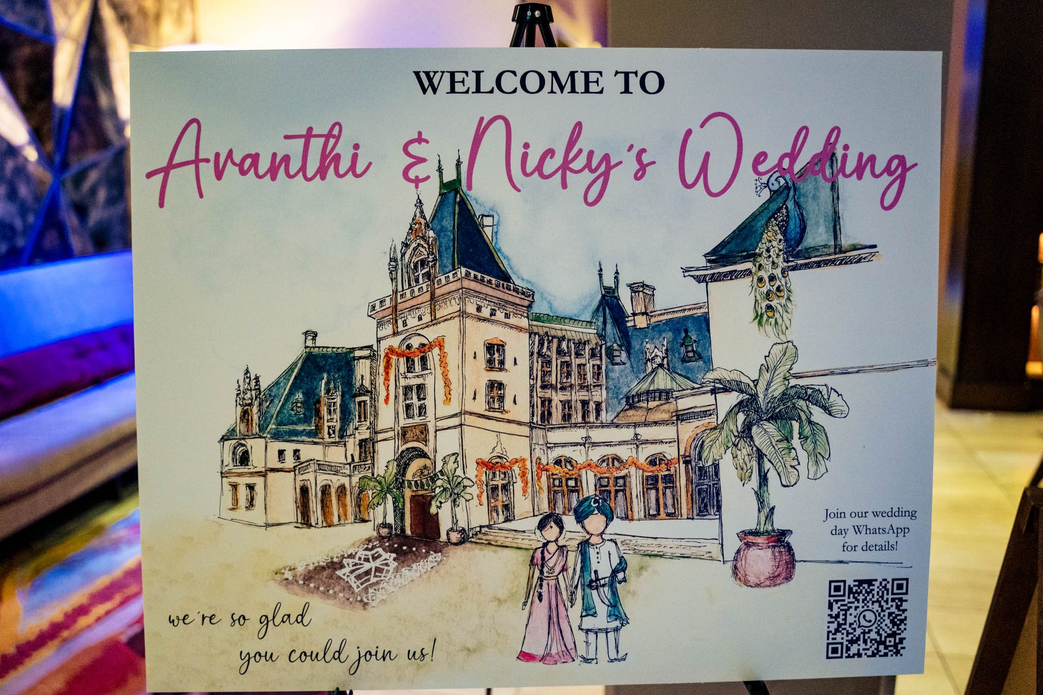 A wedding sign featuring a drawing of a man and a woman at the Biltmore Estate wedding.